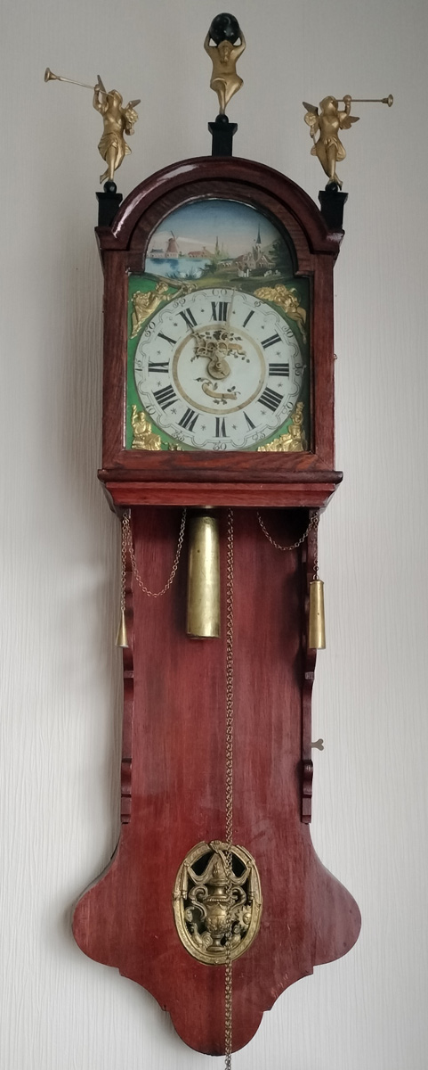 Friesian Longtail Clock